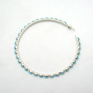 Large Light Zuni Hoops<br>By Alvin Hughte